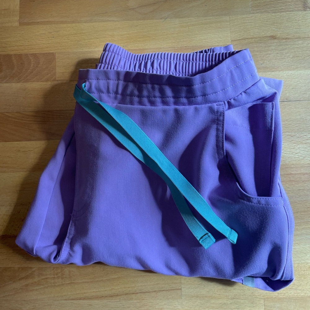 Figs Purple and Blue scrub Joggers color is the light purple in 3rd photo